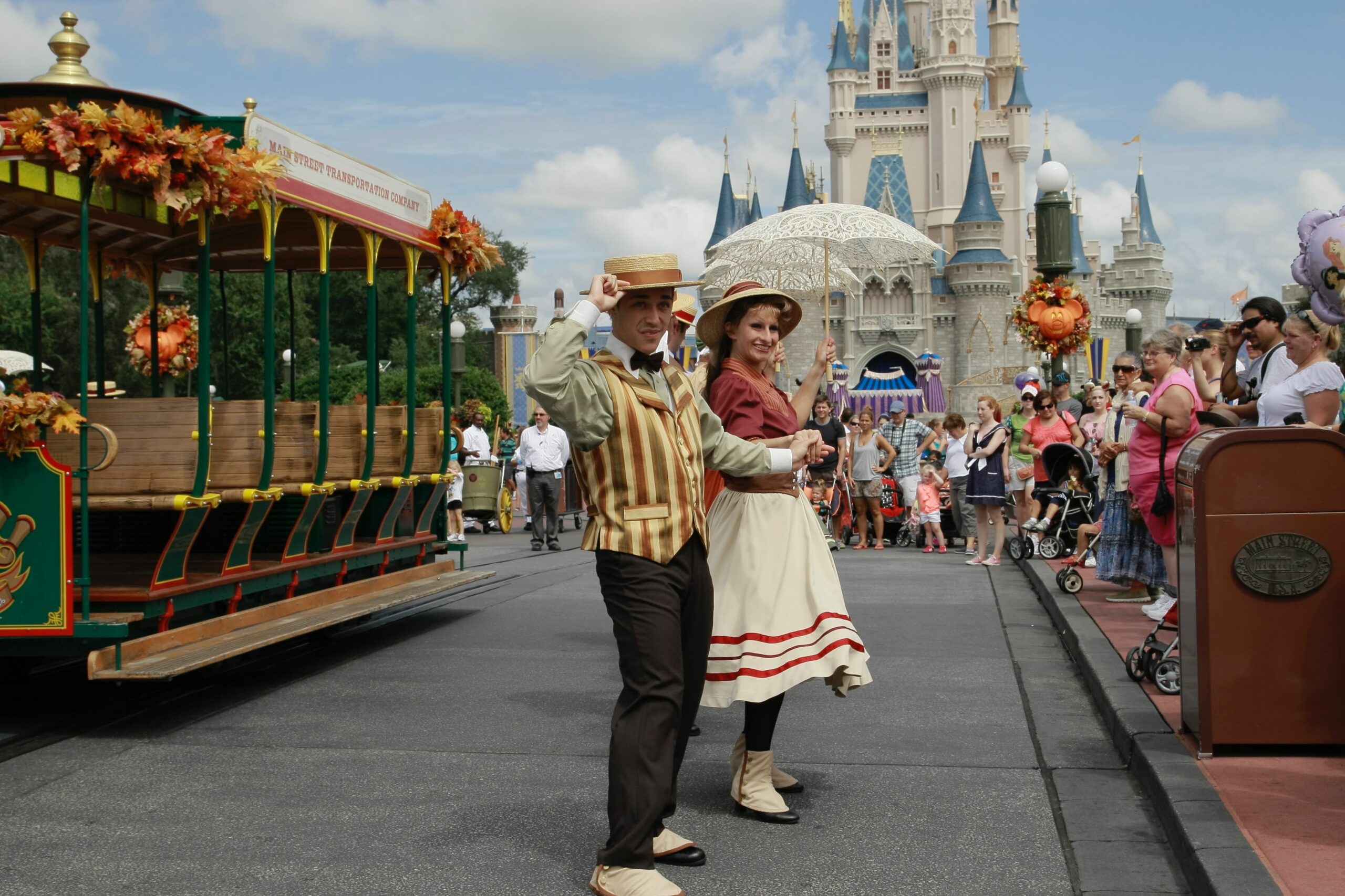 people in costumes at disneyland participating in disney's campaign and advertising strategy