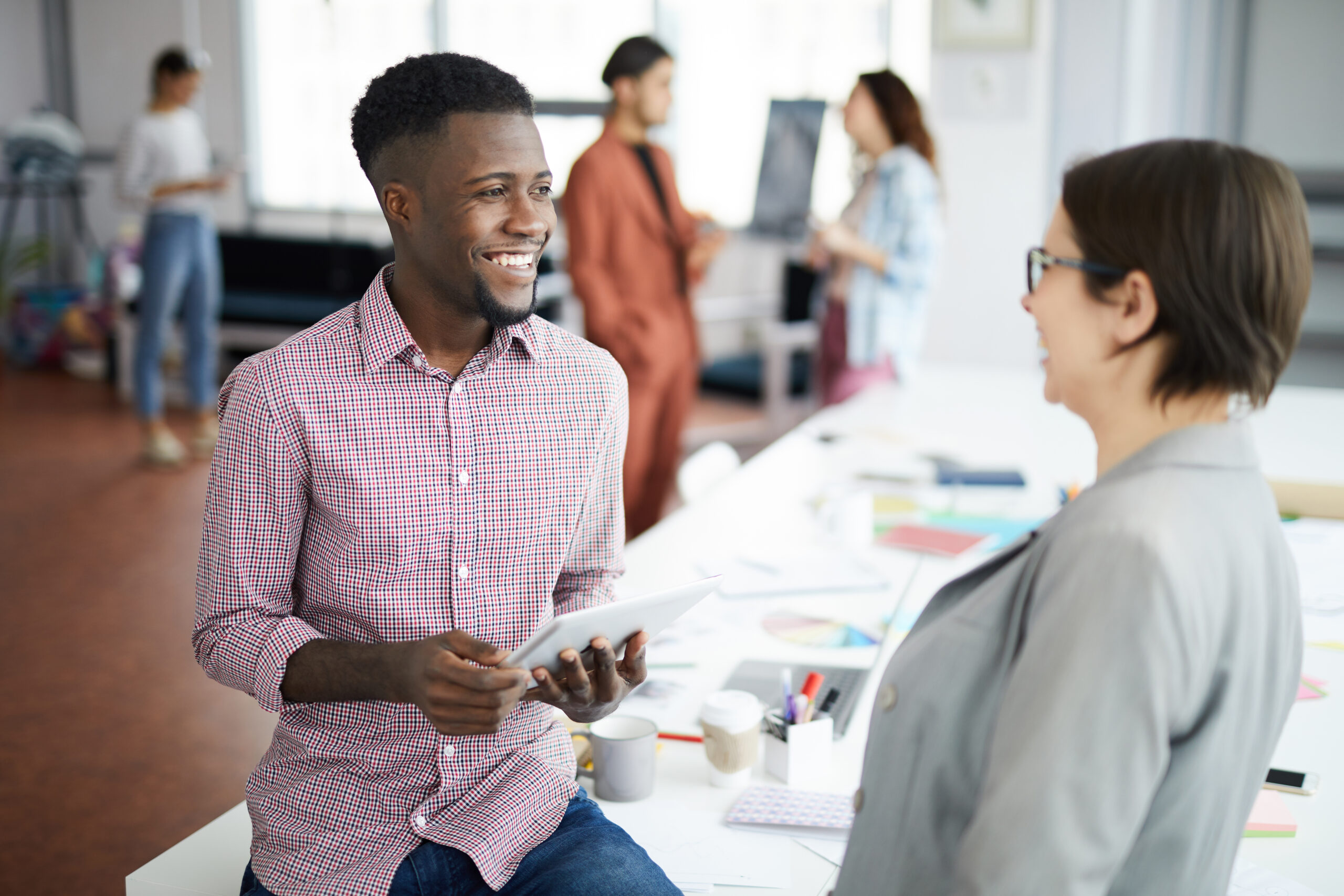 business people working in a creative agency discussing digital marketing