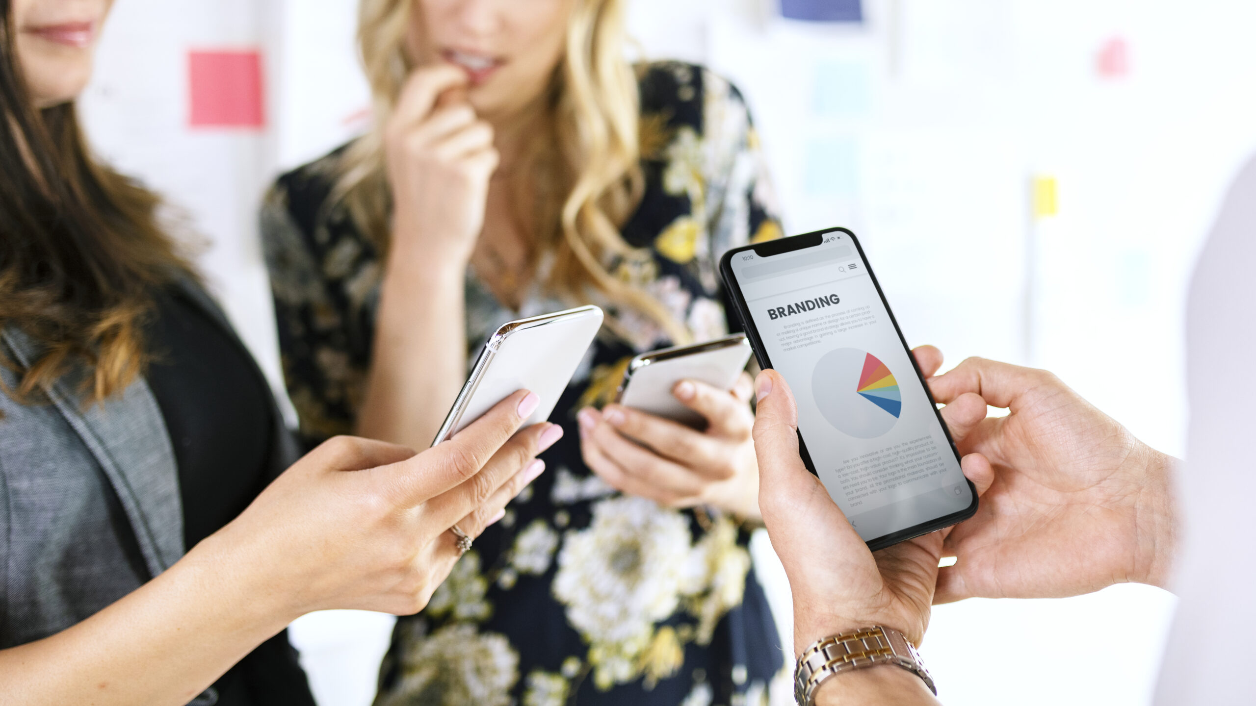 business people planning their brand’s mobile marketing strategy for 2023